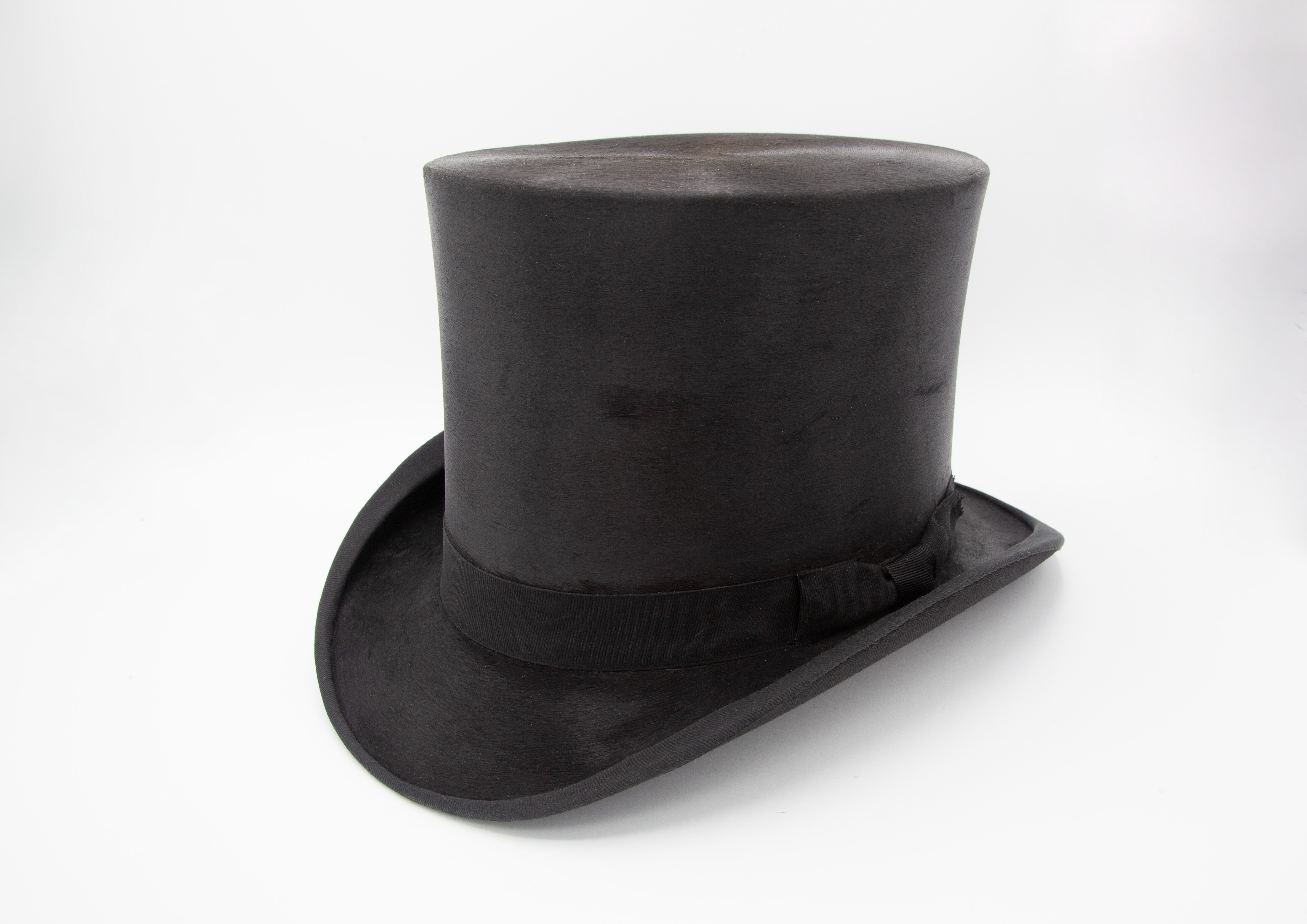 A CAMERLING Vintage black silk top hat 